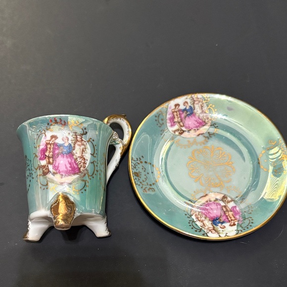 Elegant Teacup and Saucer with Gold Accents - Picture 3 of 3